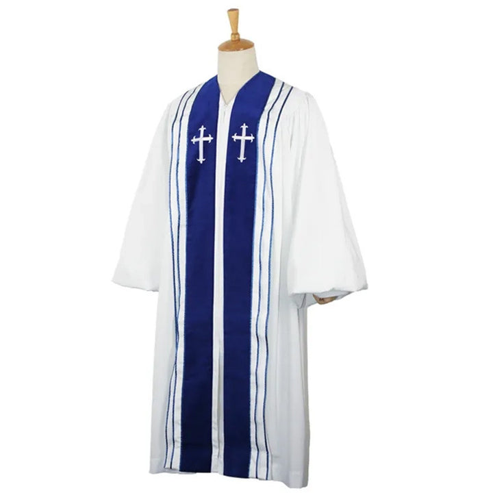 White choir robe with royal blue center stripe, dual white cross embroidery badges, black pinstripe borders, wide 3/4 sleeves, three-quarter side view on mannequin, white background