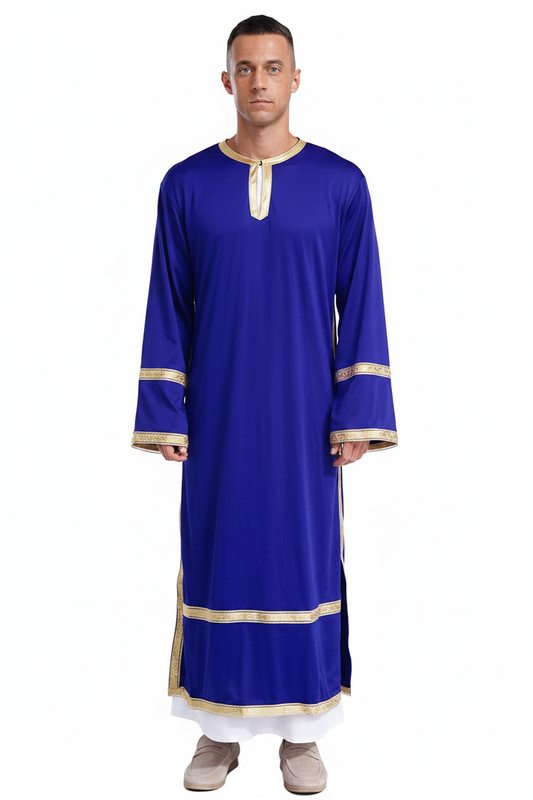 Male model wearing royal blue ethnic mission robe with gold trim over white under-layer, full body front view, white background