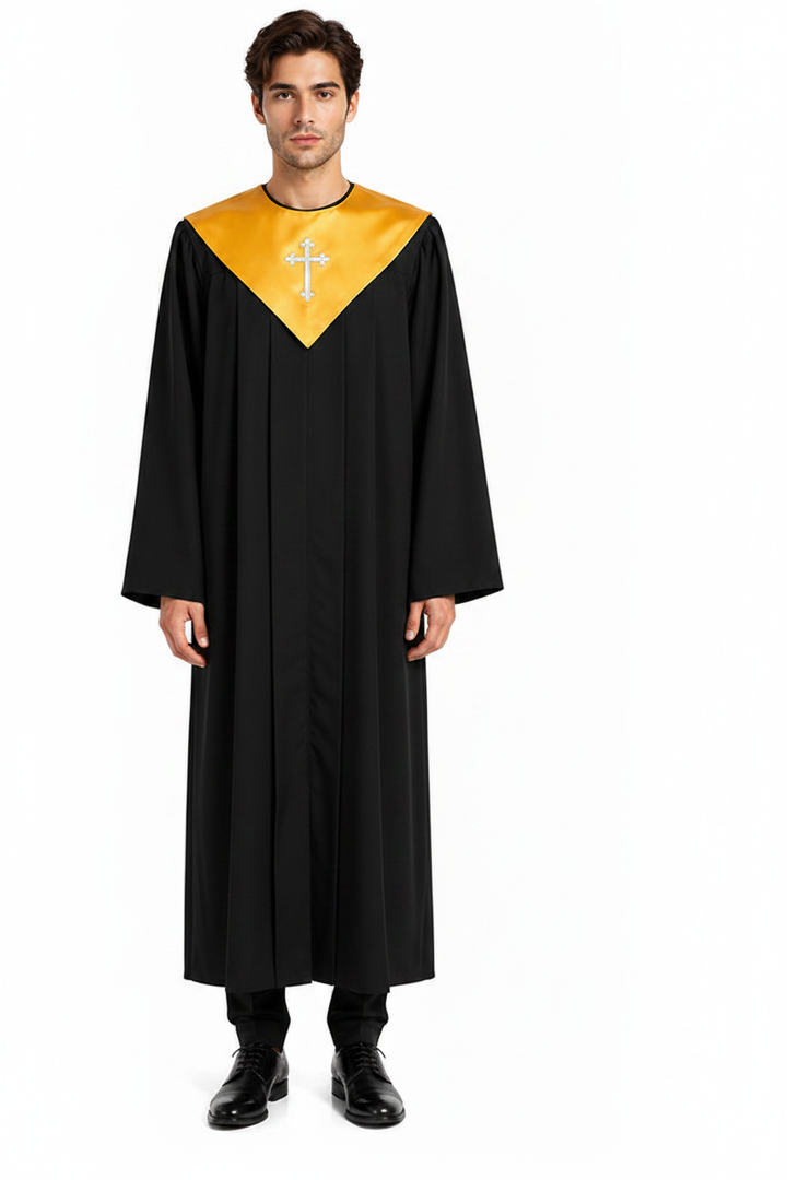 Male model wearing black choir robe with gold V-yoke collar and cross embroidery, full body front view, white background