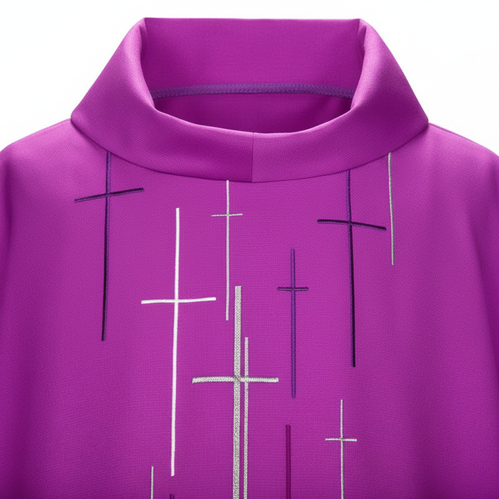 Close-up detail of purple chasuble vestment showing scattered white cross print pattern and stand collar, white background