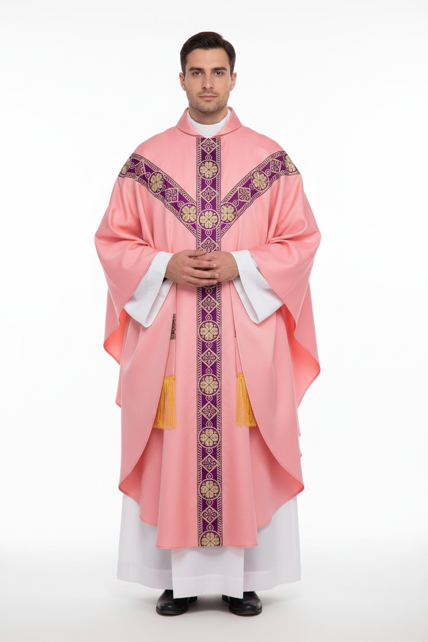 Male model wearing pink Catholic chasuble with purple embroidery cross panel and gold fringe, full body front view, white background