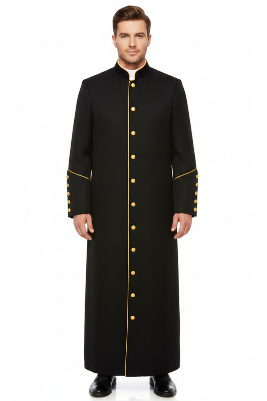 Male model wearing black clergy cassock robe with gold trim and cuff buttons, full body front view, full face visible, white background
