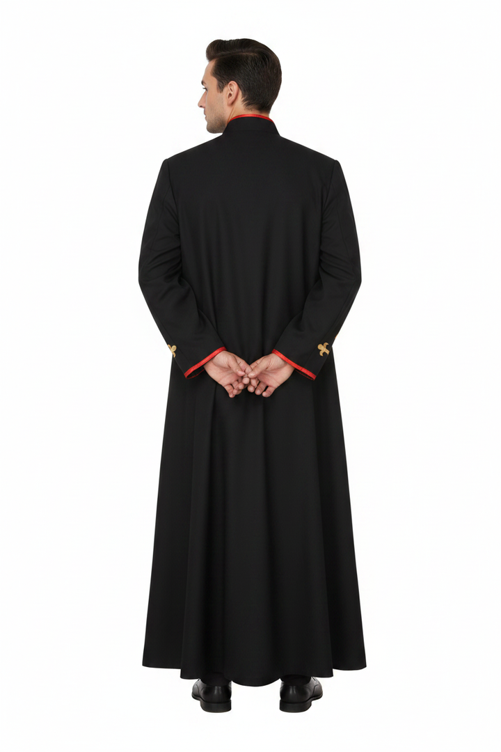 Male model wearing black priest cassock with red piping, full body back view, white background