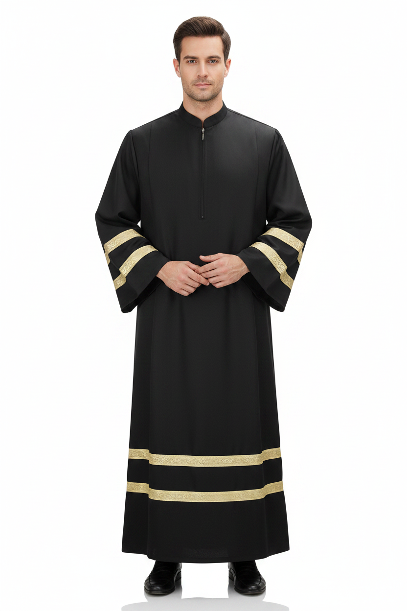 Male model wearing black liturgical choir robe with gold braid trim, full body front view, white background