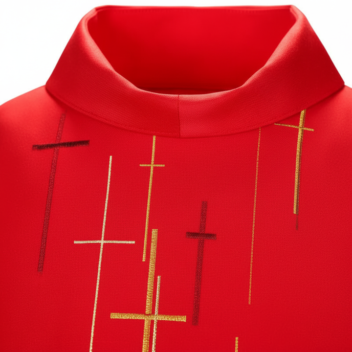 Close-up detail of red chasuble vestment showing scattered gold cross print pattern and stand collar, white background