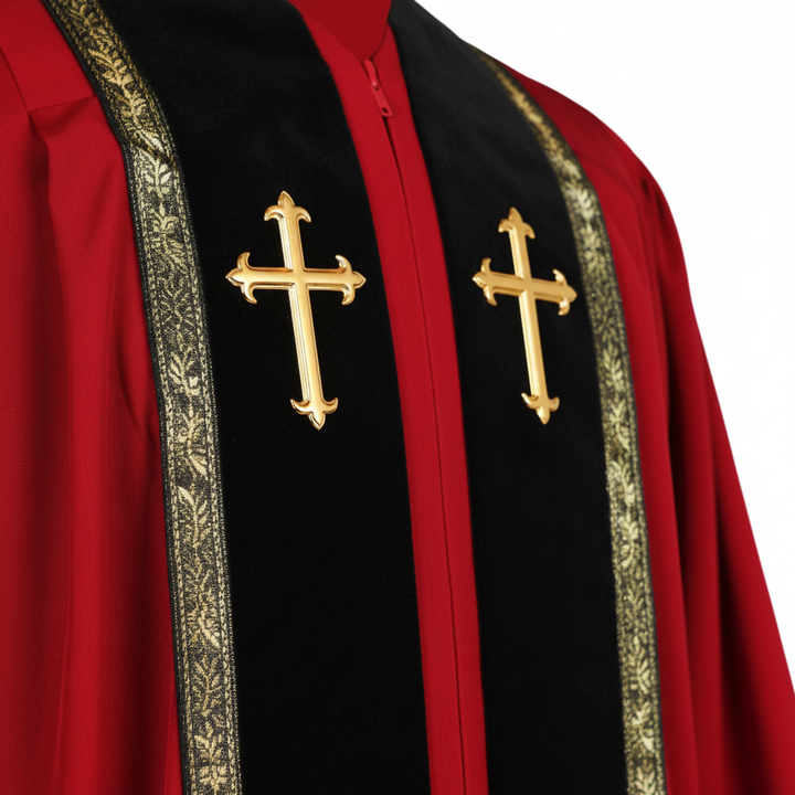 Close-up detail of clergy robe chest showing two gold cross badges on black velvet stole panel with gold wheat brocade trim on both sides, white background