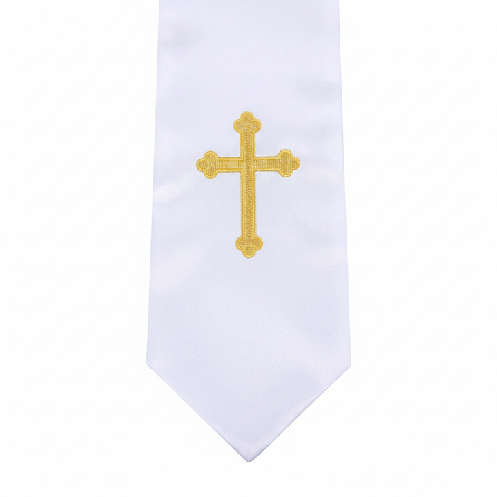 Close-up detail of white satin stole showing gold cross embroidery and pointed tip, white background