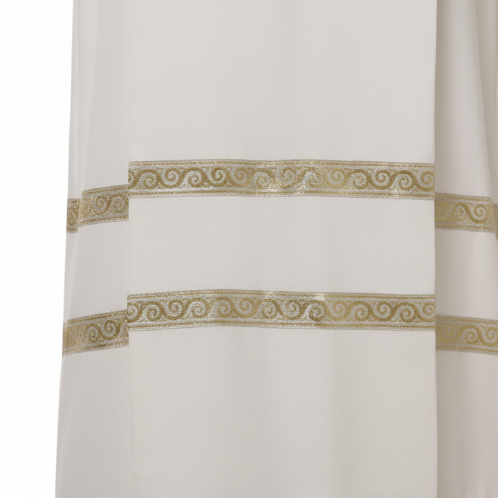 Close-up detail of ivory clergy alb robe hem showing double horizontal gold brocade stripe trim bands, white background
