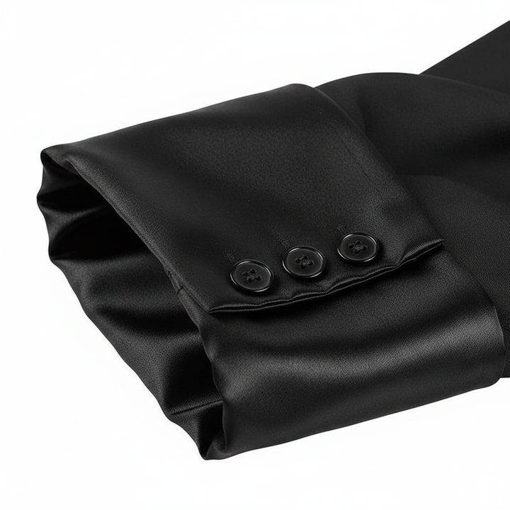 Close-up detail of black satin cuffs with button accents on barrister robe
