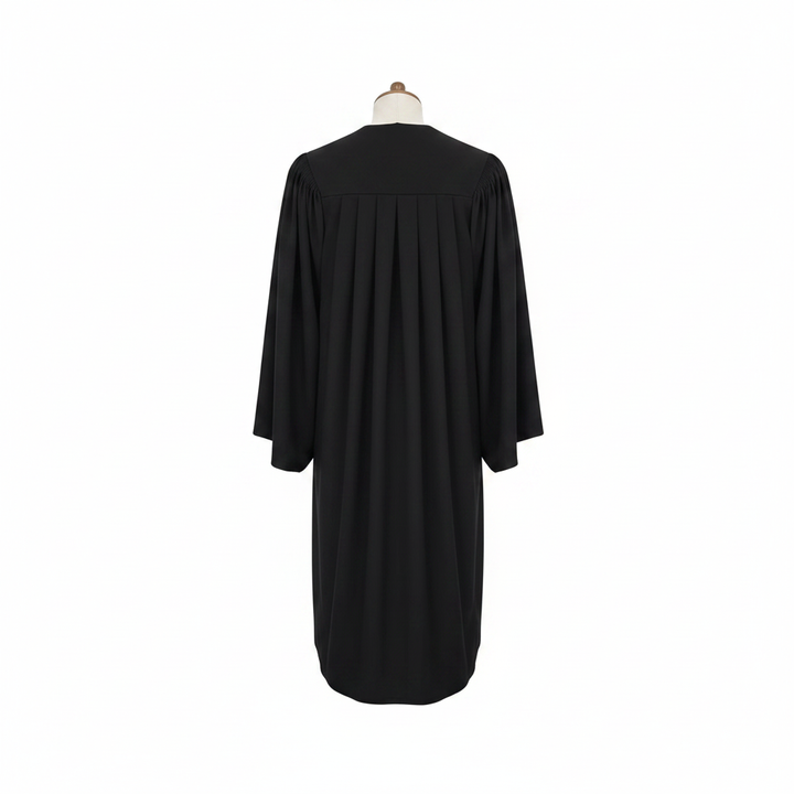 Close-up detail of the back of a black choir robe showing fabric drape and pleats, white background