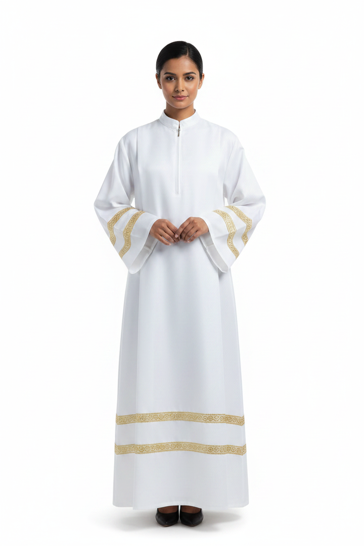 Female model wearing white liturgical alb robe Style A with gold braid trim, full body front view, white background