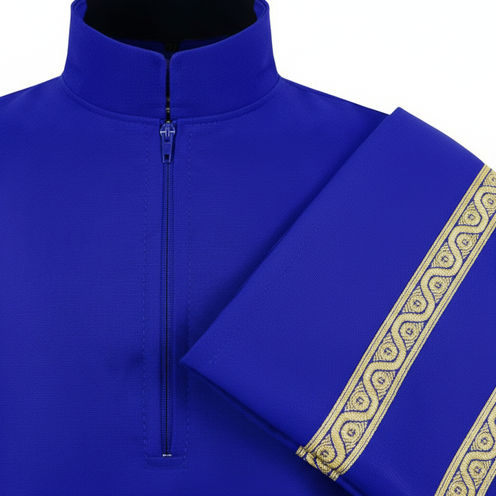 Close-up detail of royal blue choir robe showing stand collar zipper and double gold braid trim on sleeve cuff, white background