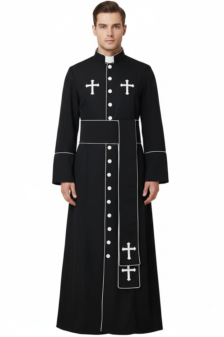 Male model wearing black clergy cassock robe with white cross embroidery, white buttons and piping trim, waist belt and stole, full body front view, white background