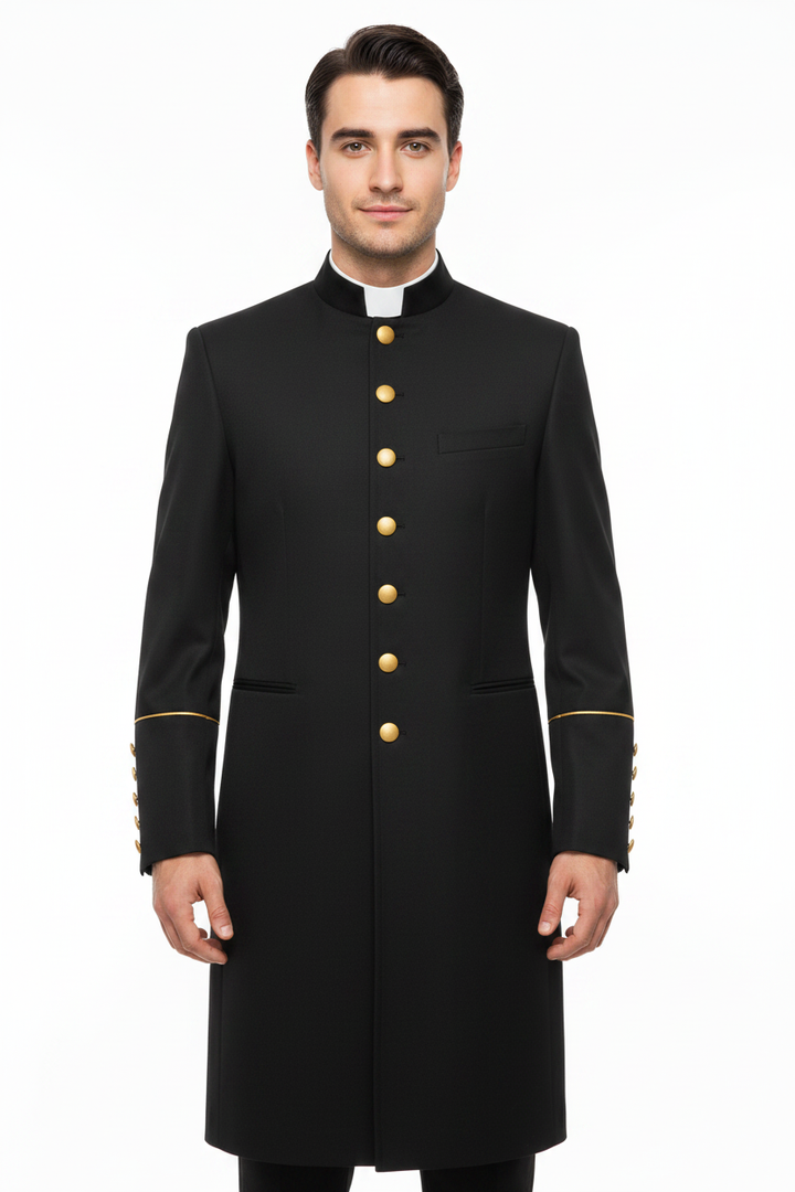 Male model wearing black clergy frock coat with gold trim and cuff buttons, full body front view, white background