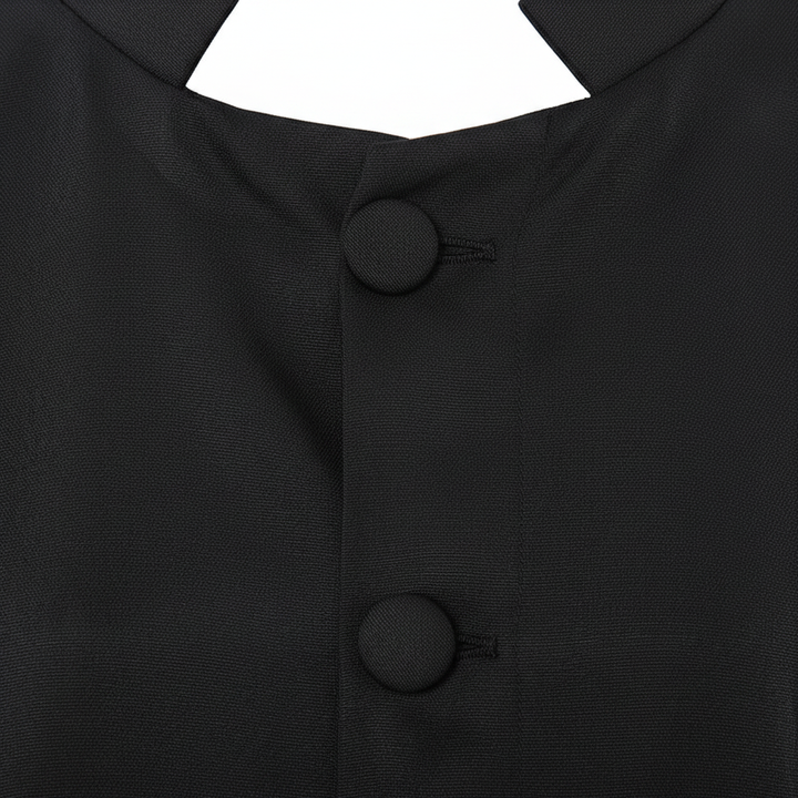 Close-up detail of black cassock robe showing full center button row from collar down the front placket, white background