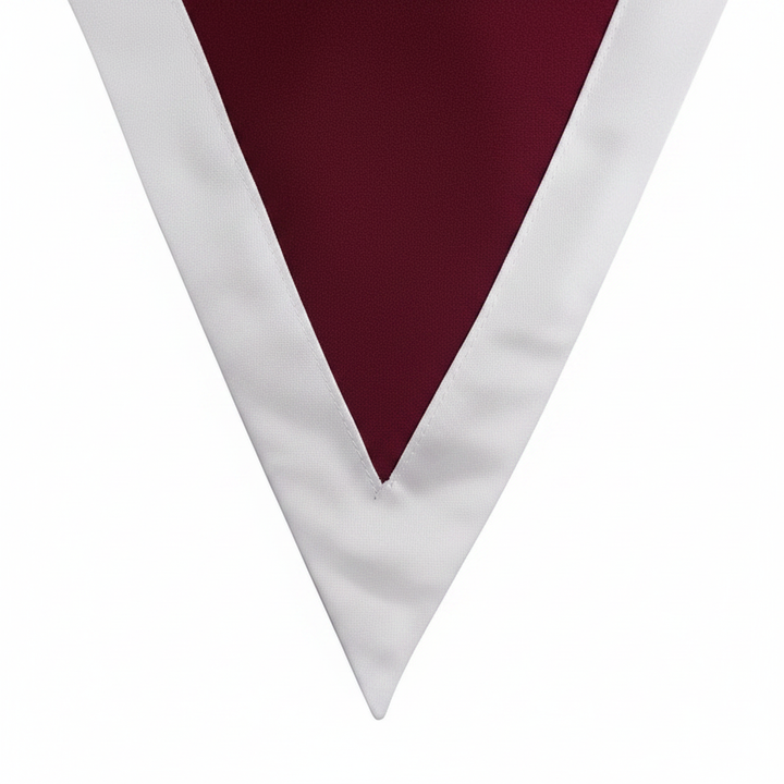 Close-up detail of dark maroon and white two-tone V-stole showing sharp V-point and satin texture, white background