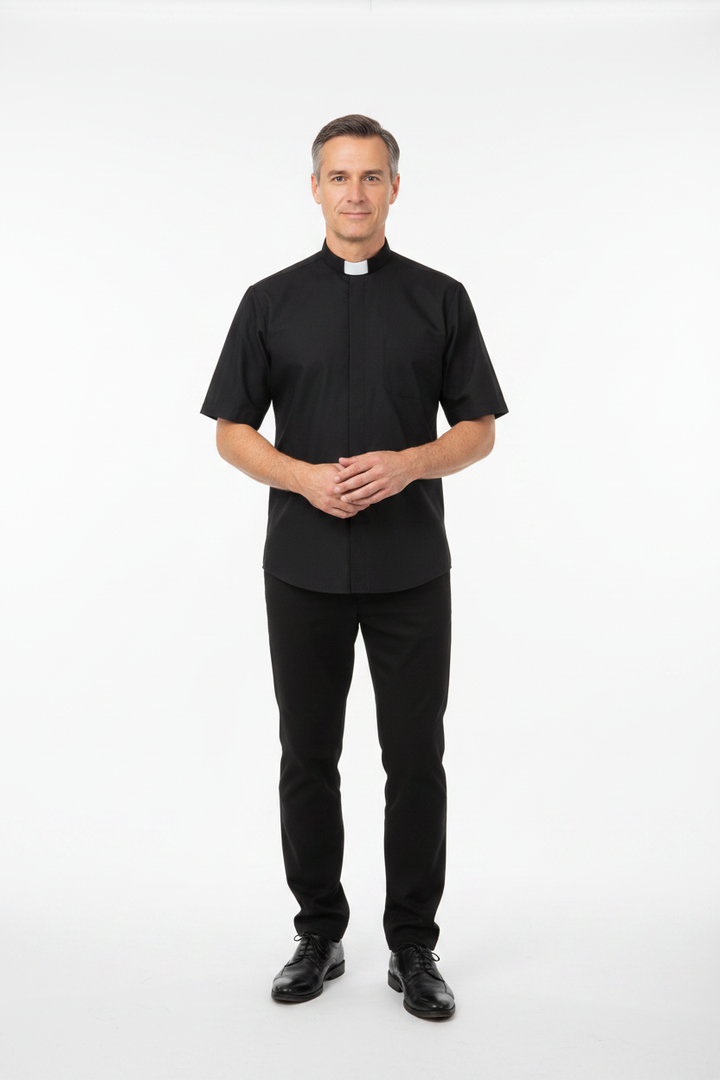 Model wearing black short sleeve clergy shirt with white tab collar, white background