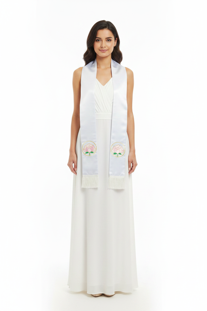 Female model wearing white satin clergy stole with lotus embroidery draped over shoulders, full body front view, white background